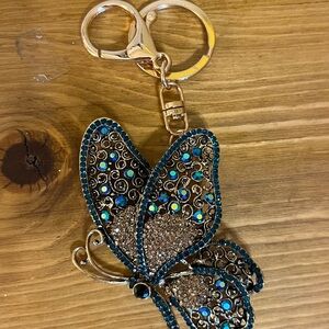 Gorgeous blue and gold rhinestones butterfly bag tag/key chain on gold chain 5”